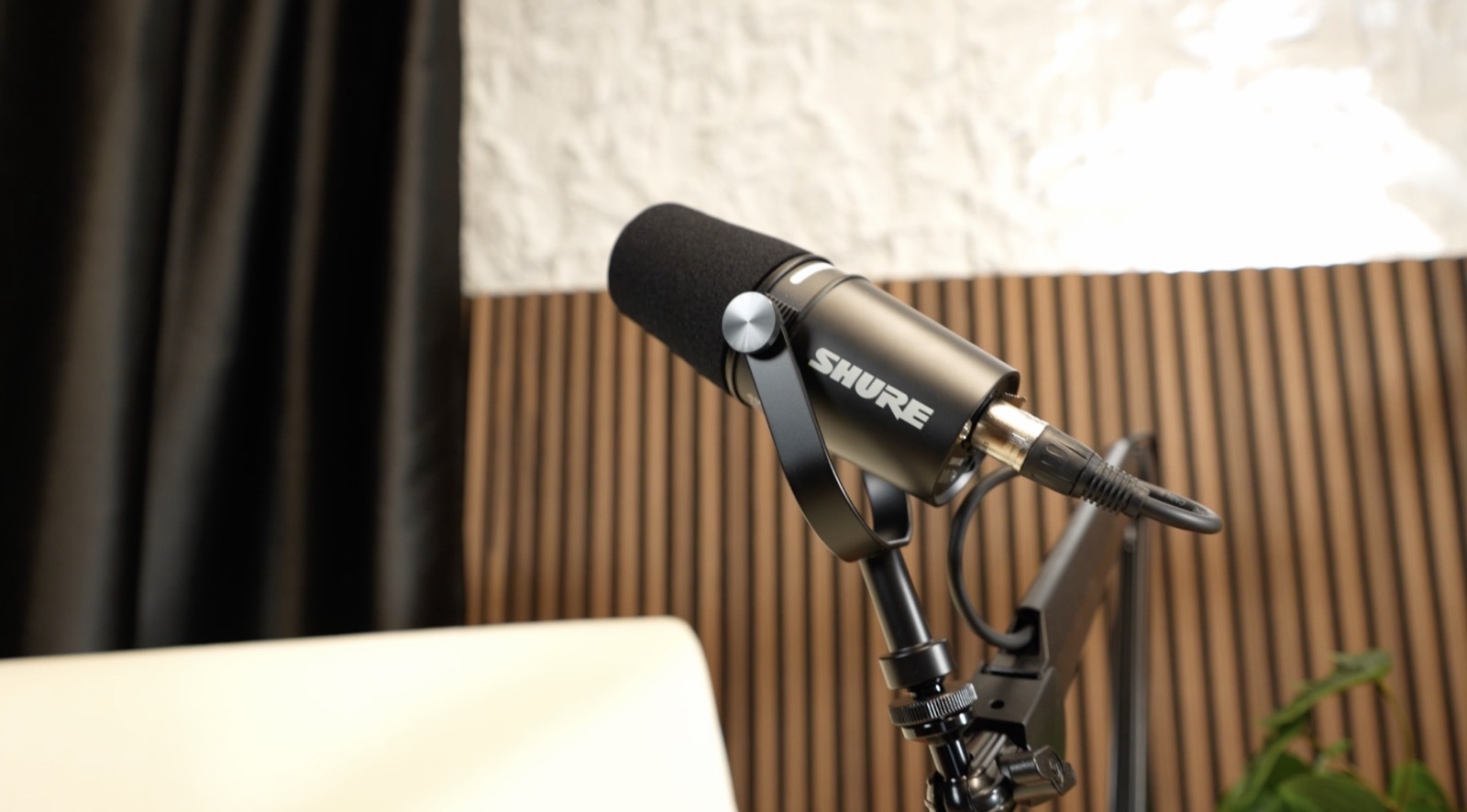 Shure broadcast microphone in the podcast studio