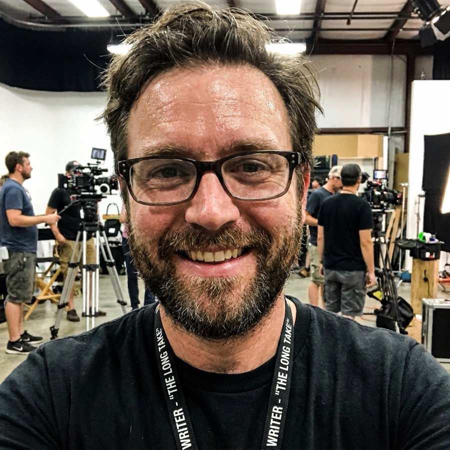 A BayHaus engineer on set, with cameras and crew working behind him