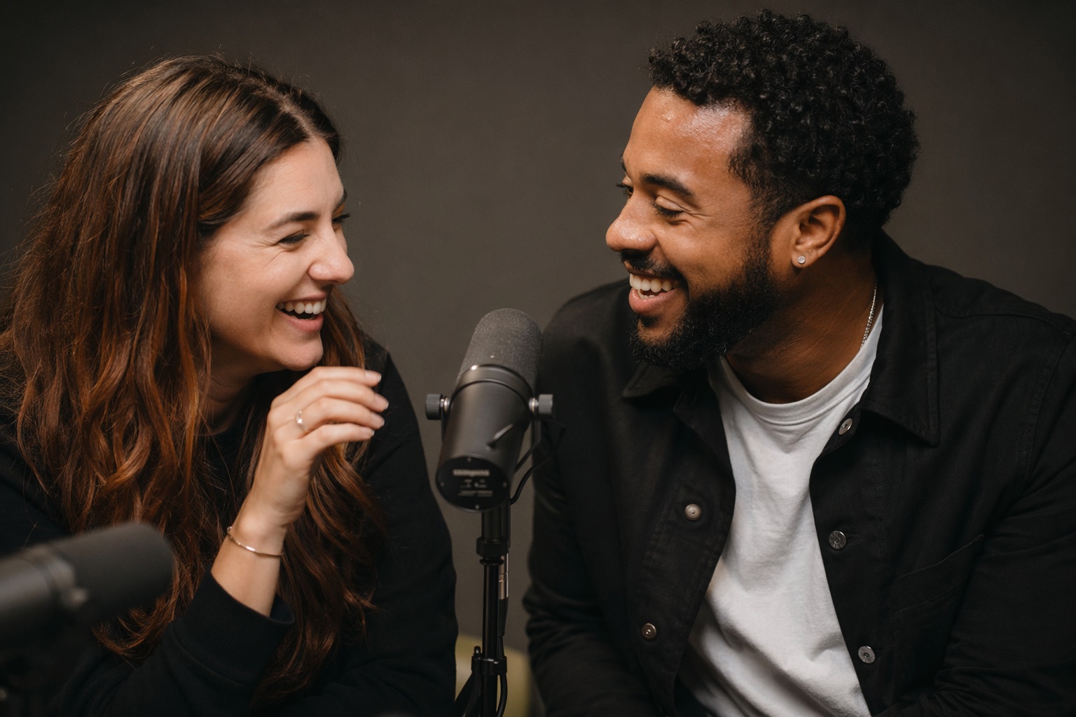 Team recording back-to-back podcast episodes on the studio set during a Creator Day session